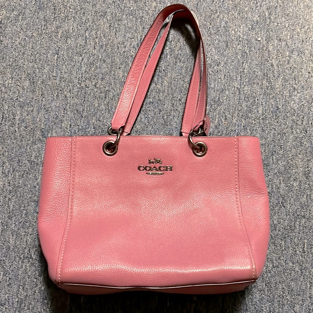 Pink coach purse! Beautiful and only worn once to nice event! Deep and spacious!